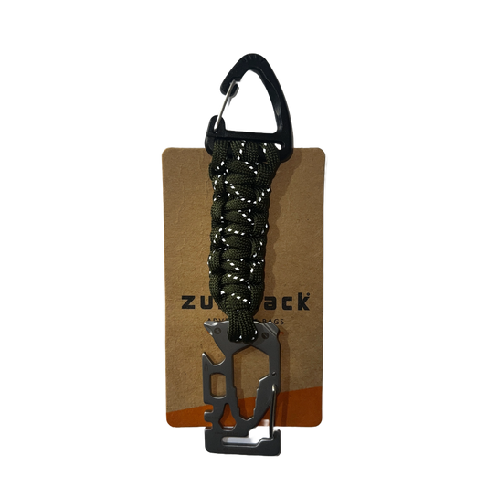 Multitool with carabiner and paracord on a branded card with 'Zulupack' logo.